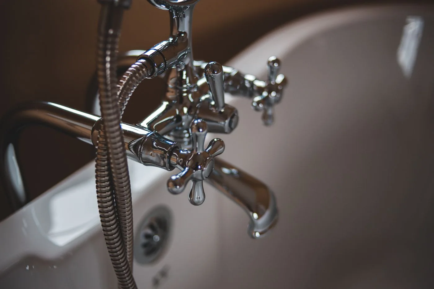 Chrome plumbing fixture in a bathroom